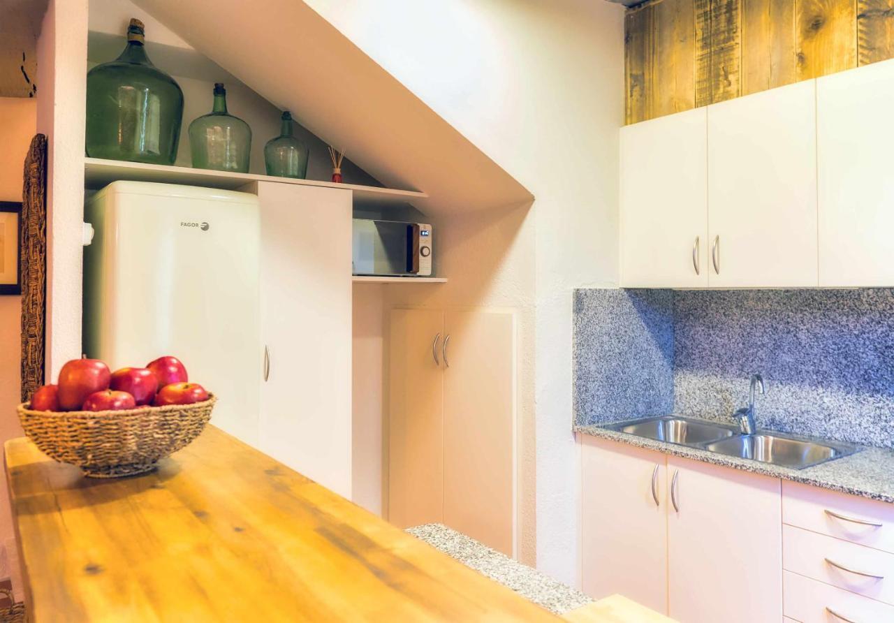 El Molino De Besalu Casa Con Jardin Villa Luaran gambar